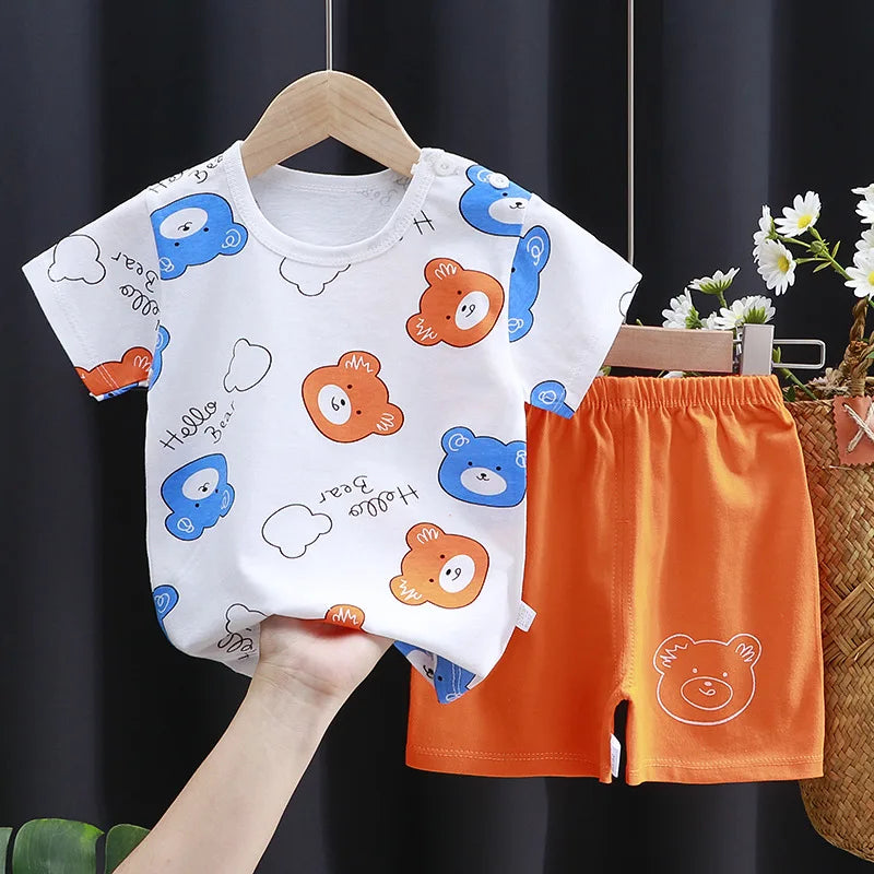 Kids Clothes Set featuring a playful monkey design, showcasing fun activities like ice and sponge application for kids.