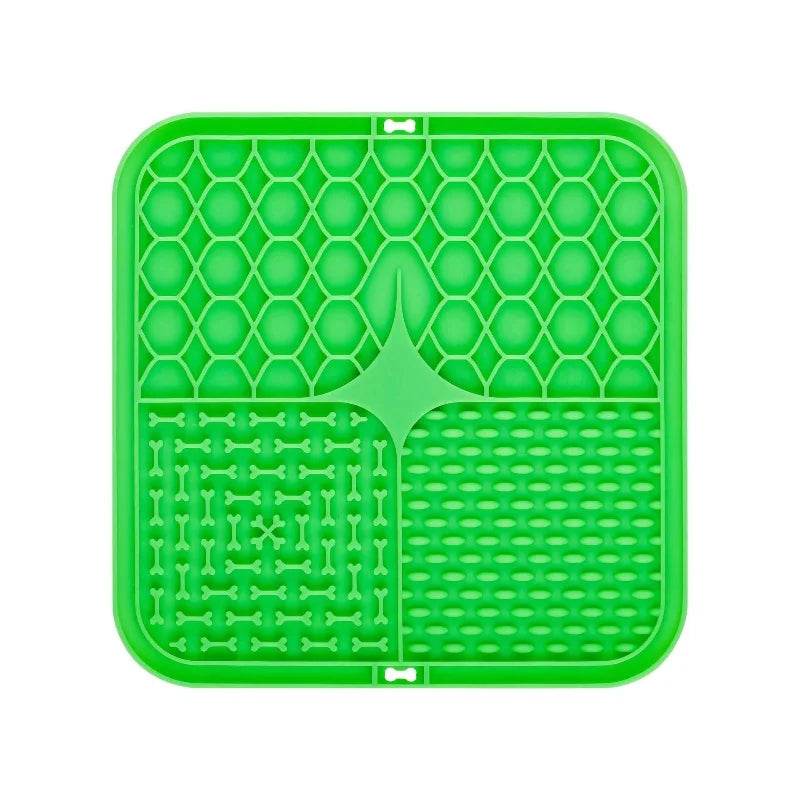 Green silicone mat with textured design on a white background