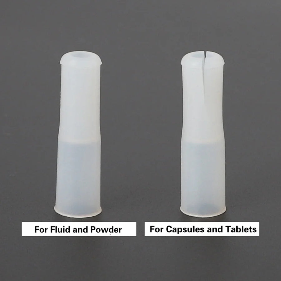 Two soft silicone pill feeder tips labeled for fluid/powder and capsules/tablets on dark background – replacement soft tips for pet pill syringe