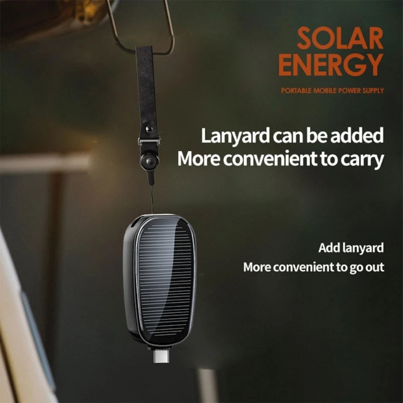 Solar energy portable power supply with lanyard attachment on a blurred background
