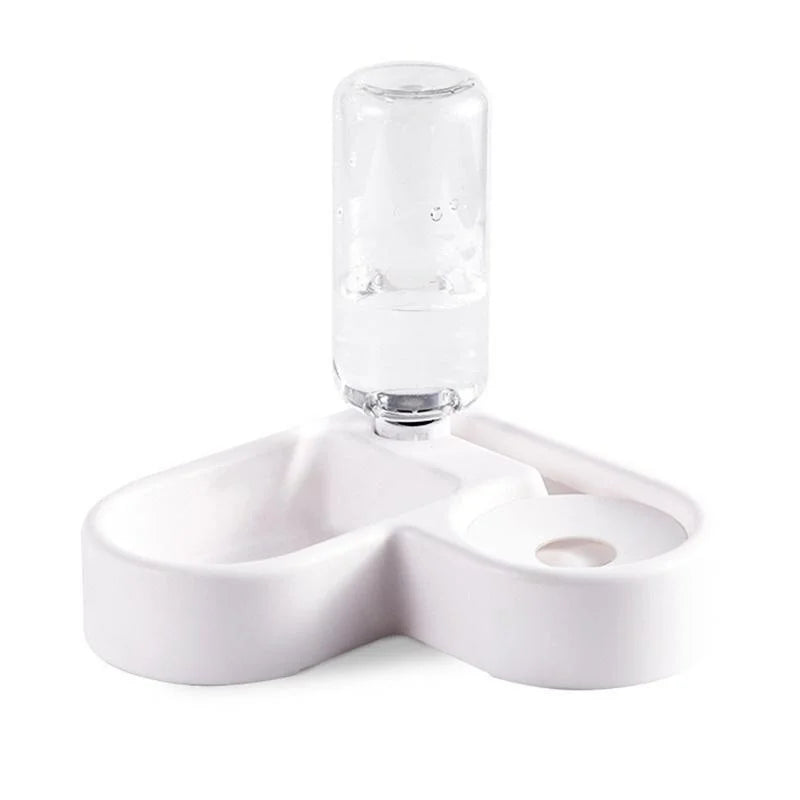 Clear glass bottle with white ceramic holder on a white background