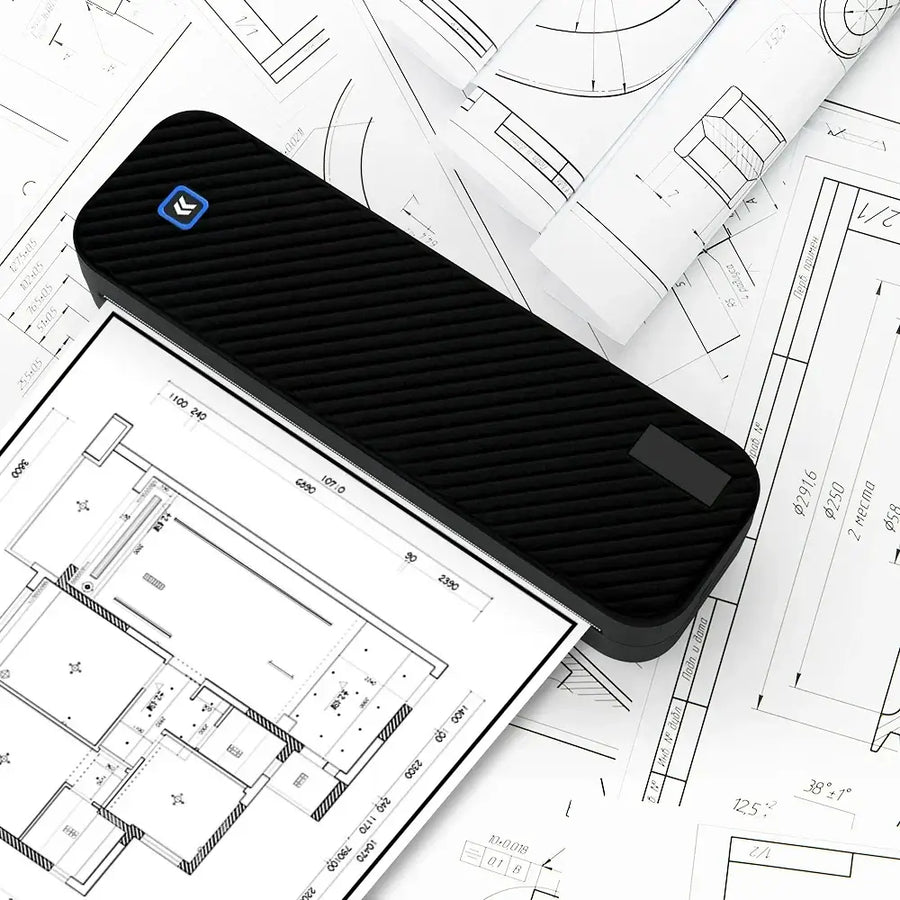 Black portable thermal printer with blue logo on architectural blueprints — wireless Bluetooth inkless A4 mini printer
