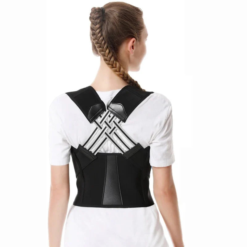 Person wearing a black posture corrector on a white background