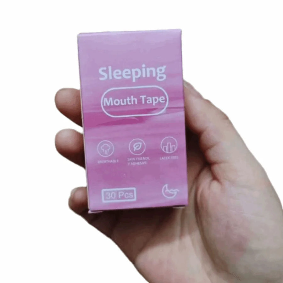 Hand holding pink Sleeping Mouth Tape box — anti-snoring mouth strips for sleeping, 30 pcs