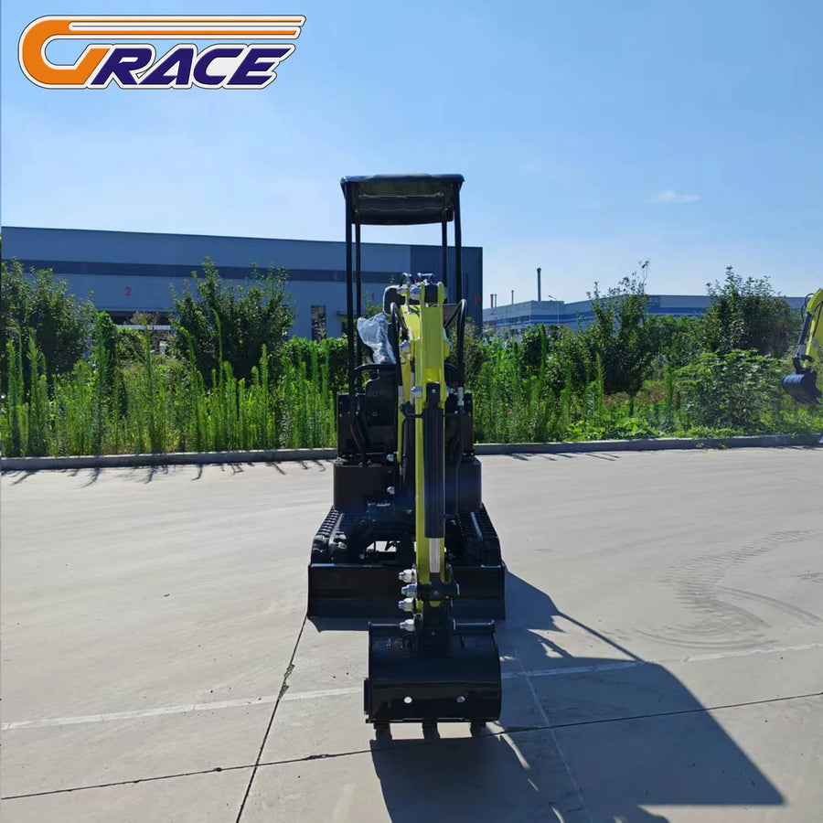 1.8 ton mini excavator – black and yellow crawler digger with open cab, photographed on concrete lot