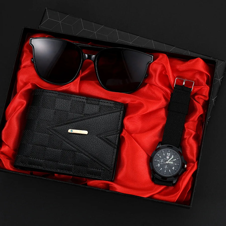 Black sunglasses, wallet, and watch in a black box with red interior