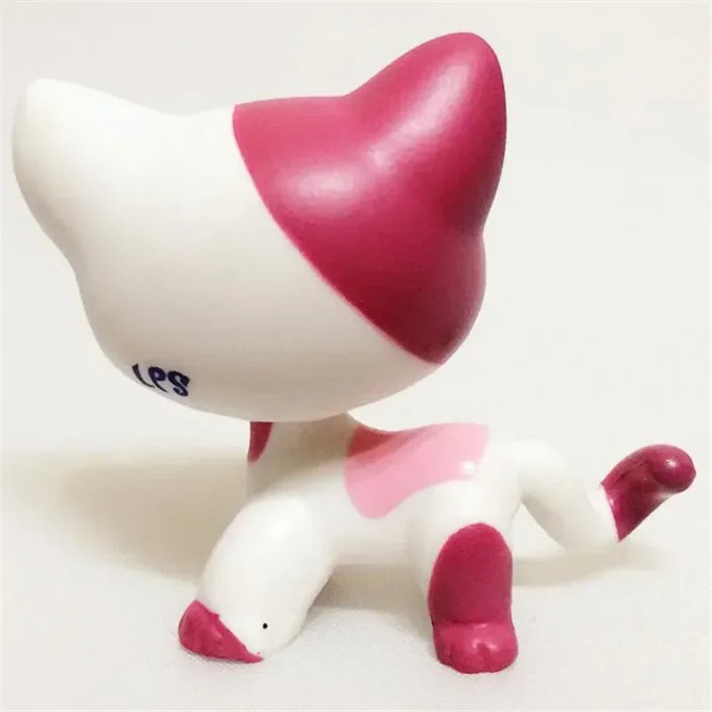 Mini pet shop kitty figure – white with pink and magenta patches, back view