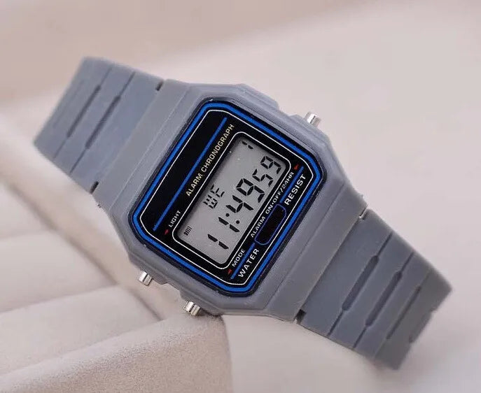Men's gray LED digital military watch with blue accents, alarm chronograph and water resistance, on light background.