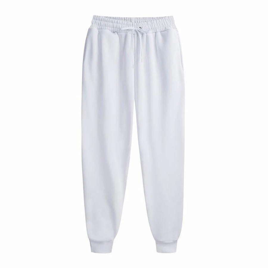 Men's white jogger sweatpants detail view on white background