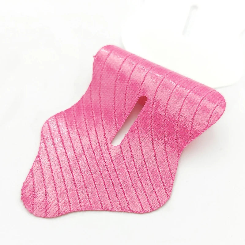 Pink textured mouth tape strips stacked on white background