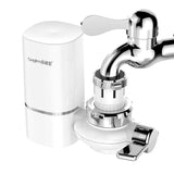 Chrome kitchen faucet with white filter housing on a white background