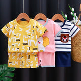 Kids Clothes Set featuring a green T-shirt with a matching shorts outfit for baby boy or girl.