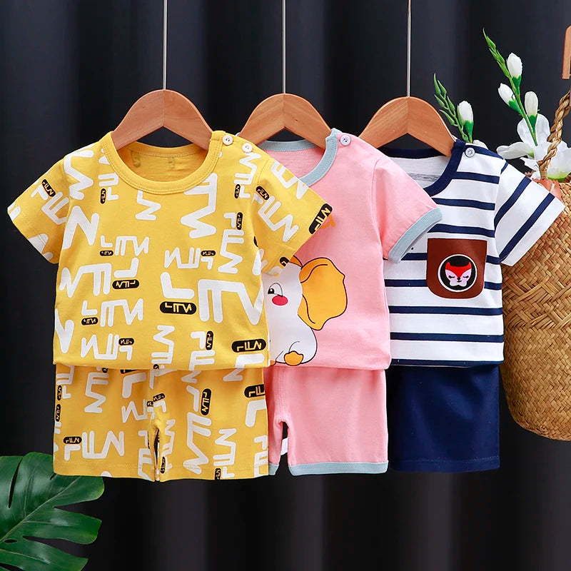 Kids Clothes Set featuring a green T-shirt with a matching shorts outfit for baby boy or girl.