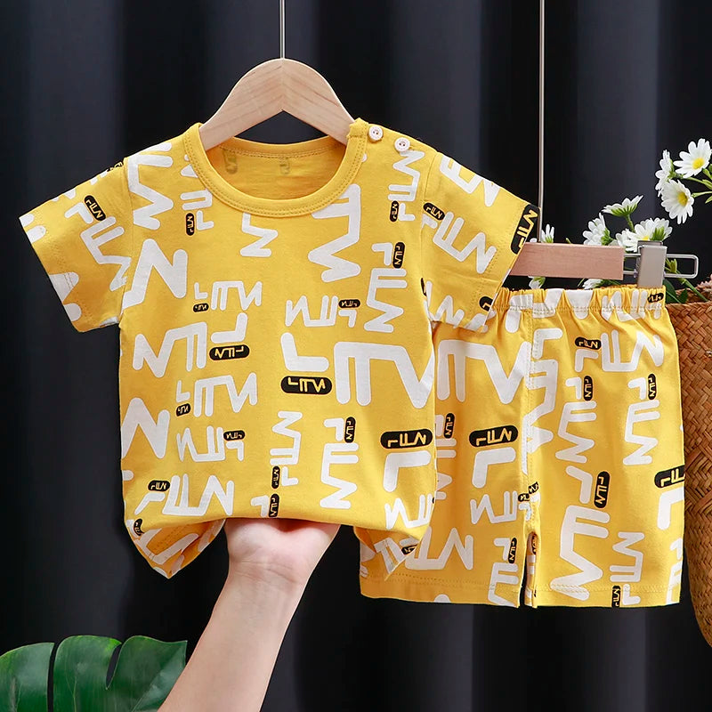 Kids Clothes Set featuring a playful monkey design, showcasing fun activities like ice and sponge application for kids.