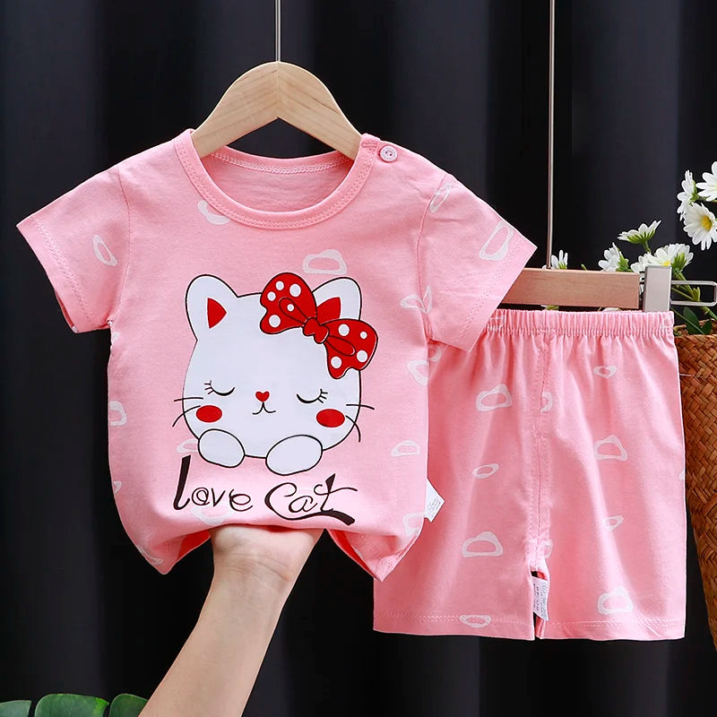 Kids Clothes Set featuring a playful monkey design, showcasing fun activities like ice and sponge application for kids.