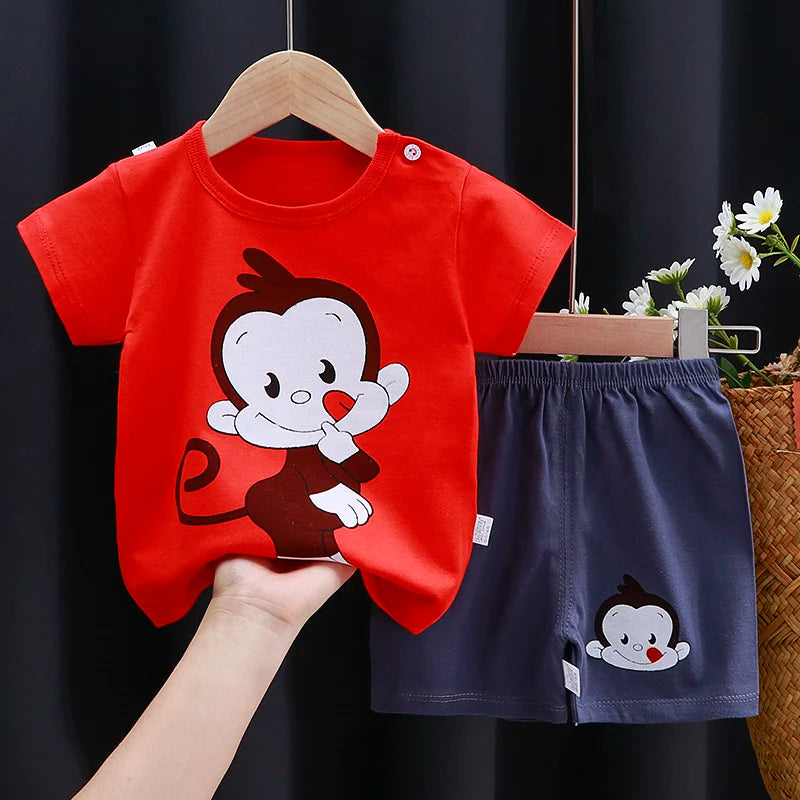 Kids Clothes Set featuring a playful monkey design, showcasing fun activities like ice and sponge application for kids.
