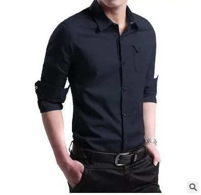 Men's black casual button-down shirt with rolled-up sleeves, worn by a model