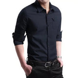 Men's black casual button-down shirt with rolled-up sleeves, worn by a model