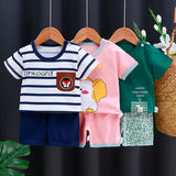 Kids Clothes Set featuring a green T-shirt with a matching shorts outfit for baby boy or girl.