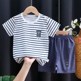 Kids Clothes Set featuring a playful monkey design, showcasing fun activities like ice and sponge application for kids.