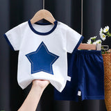Kids Clothes Set featuring a playful monkey design, showcasing fun activities like ice and sponge application for kids.