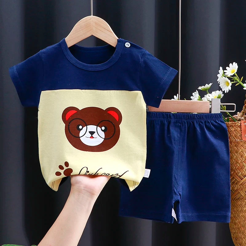 Kids Clothes Set featuring a playful monkey design, showcasing fun activities like ice and sponge application for kids.