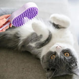 Cat being groomed with the purple pet steam brush on a neutral background – 3-in-1 deshedding grooming comb with steam spray