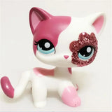 Mini pet shop kitty figure – white with pink patches and glitter detail
