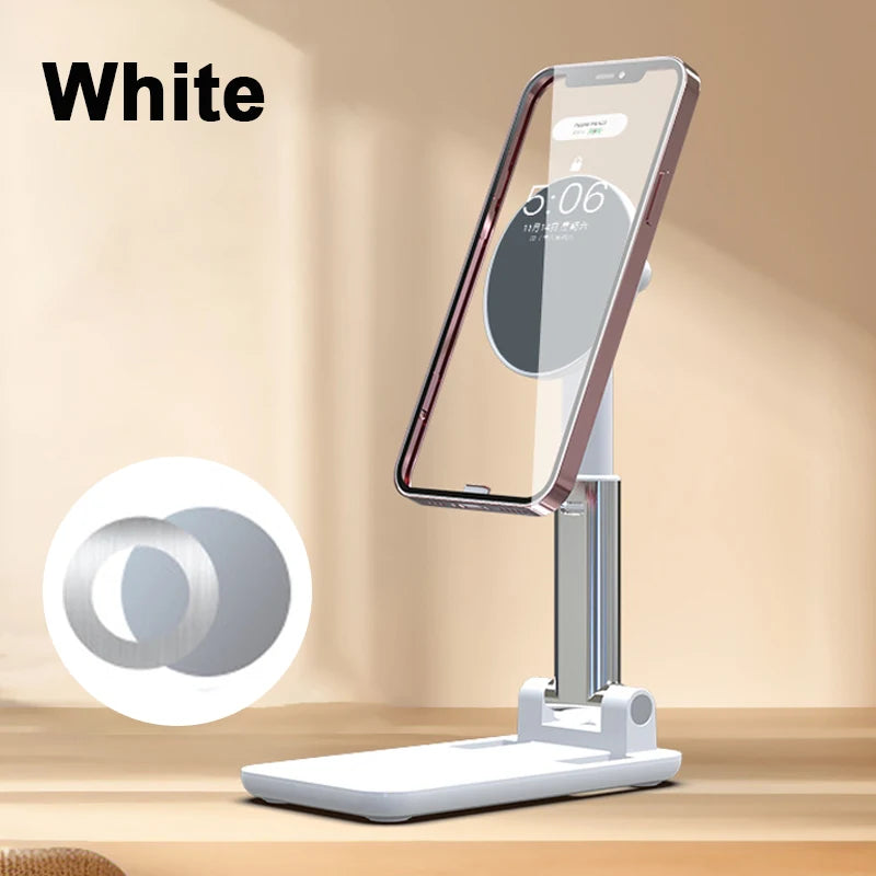 White foldable MagSafe phone stand holding a smartphone on a wooden surface.