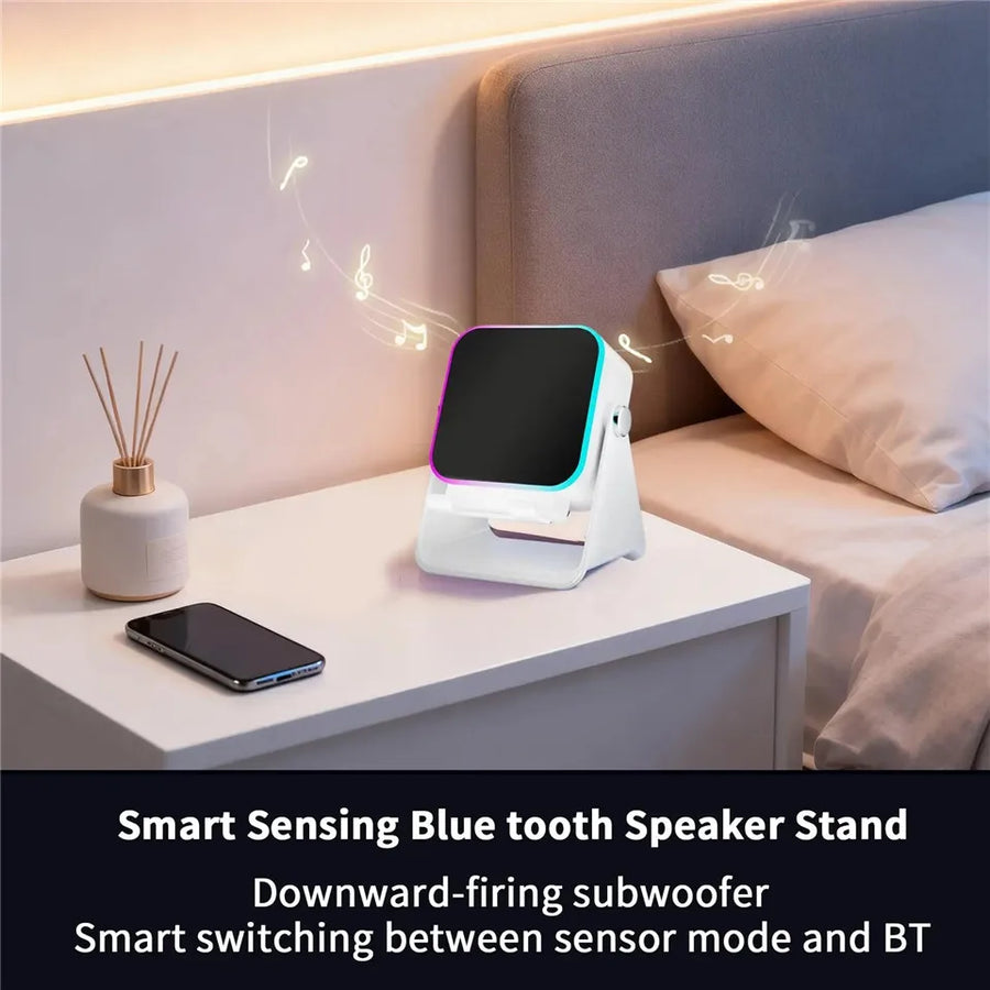 Smart sensing Bluetooth speaker stand on a nightstand with a phone and diffuser in a bedroom setting.