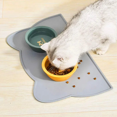 Pet feeding mat – cat eating from a waterproof non-slip gray placemat