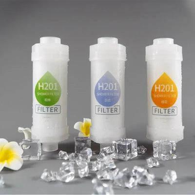 Scented shower head water softener filter – three H201 shower filter cartridges with flowers and ice cubes on gray background