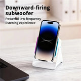 Phone dock with downward-firing subwoofer on a desk with text overlay