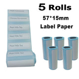 Five rolls of thermal label paper rolls for mini Bluetooth thermal label printer on white background