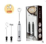 Silver handheld USB rechargeable milk frother with balloon whisk attachment and retail box