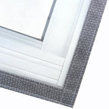 Close-up of a window screen with grid pattern on a white background