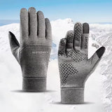 Gray winter touchscreen gloves with SPORT branding and textured non-slip palm, shown against a snowy mountain background