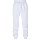 Men's white casual jogger sweatpants with cuffed ankles on white background