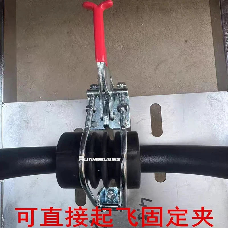 A close-up of a metal clamp tool with a red handle, mounted over a black cylindrical bar. The clamp has visible branding text reading 'RUTINGXUAKING' and Chinese text overlaid at the bottom.