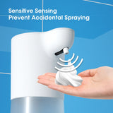 Automatic foam soap dispenser with sensitive sensor preventing accidental spraying, foam dispensed onto a hand against a blue background