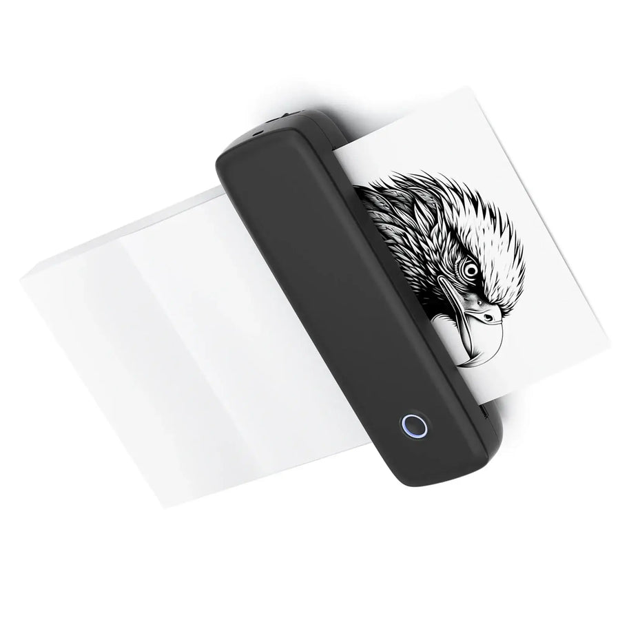 Black portable Bluetooth thermal label printer on a white surface with printed eagle image — wireless inkless label maker for shipping labels