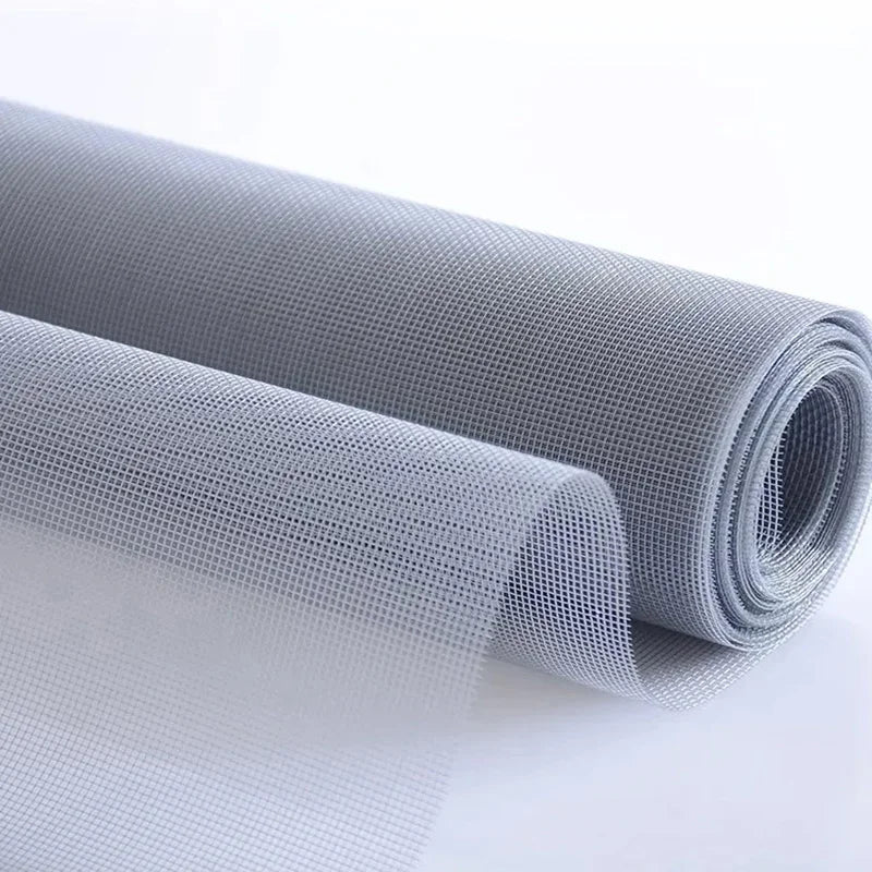 Roll of gray mesh fabric on a white background