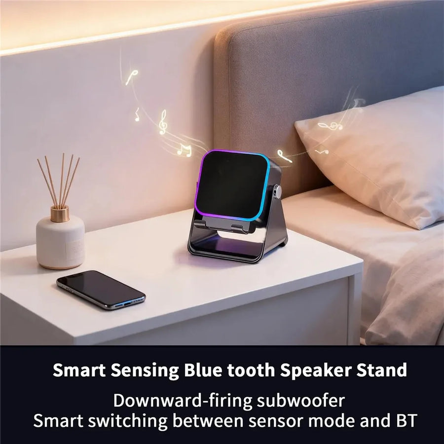 Smart sensing Bluetooth speaker stand on a nightstand with a phone next to it, in a bedroom setting.