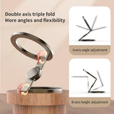 Double-sided MagSafe phone holder ring stand with adjustable axes on wooden surface