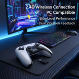 Gaming setup with controller, keyboard, mouse, and monitor on a desk.