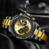 Luxury watch with gold and black strap on a dark background