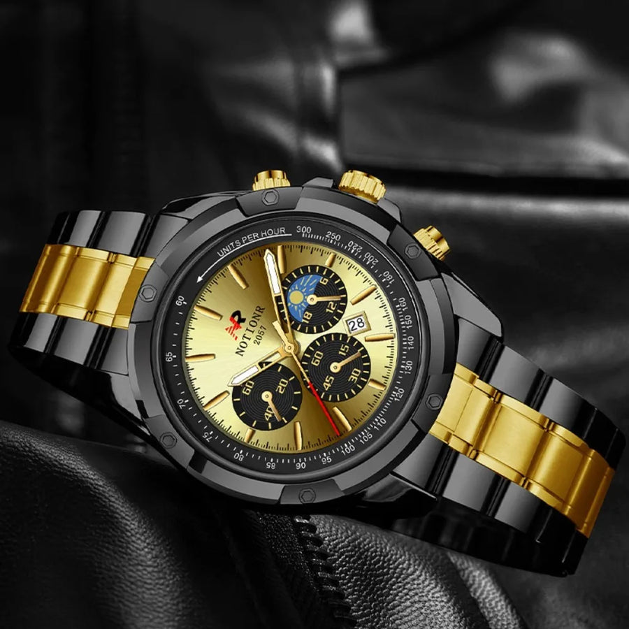 Luxury watch with gold and black strap on a dark background