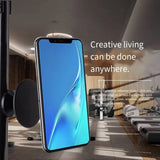 Smartphone mounted on a magnetic stand with a modern interior background