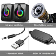USB wired computer speakers with LED light beside a smartphone, showcasing vibrant LED lighting and modern design.