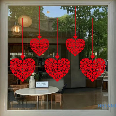 Heart stickers on glass window